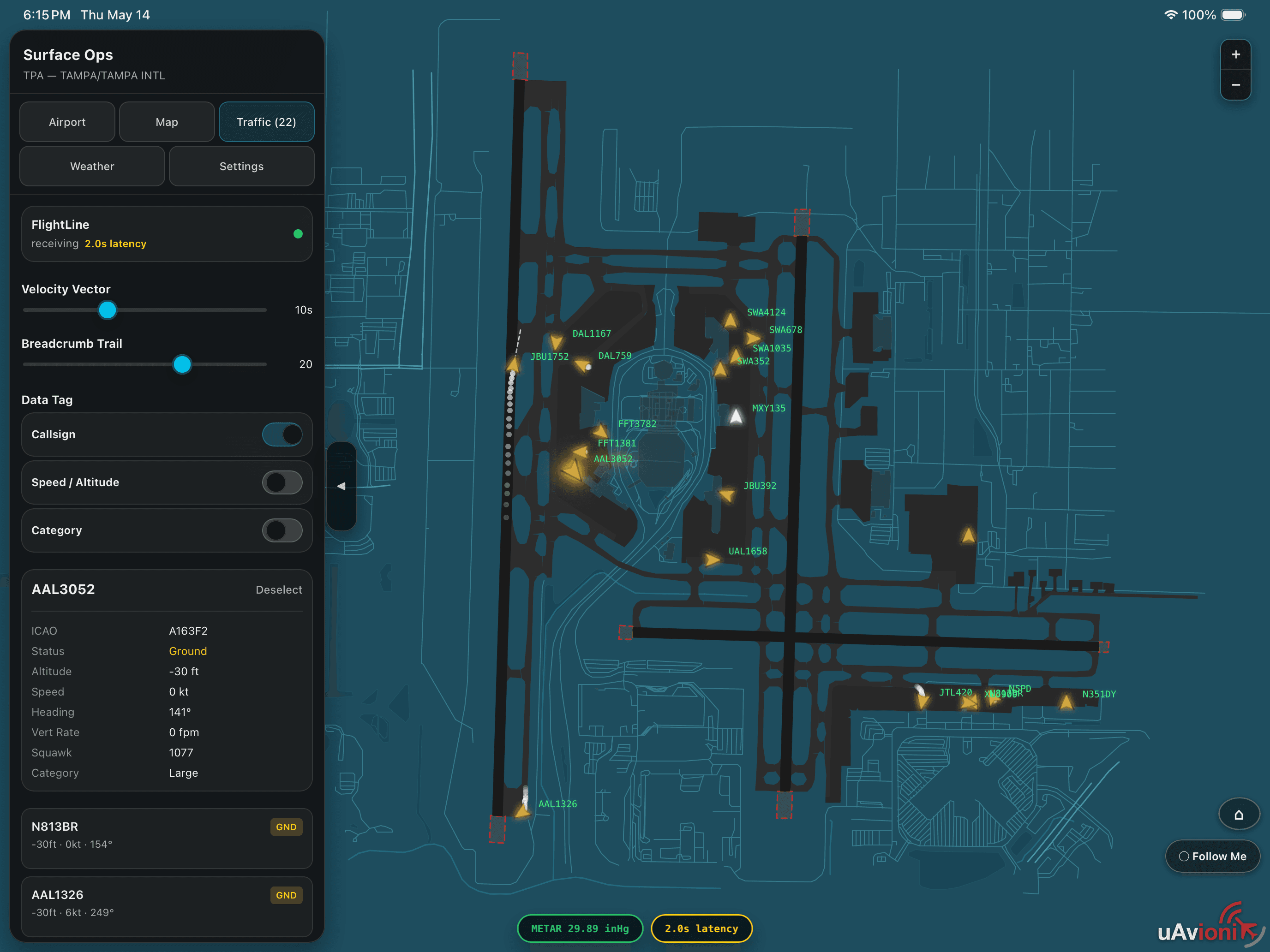 SurfaceOps traffic panel on iPad with FlightLine velocity vector, breadcrumb trail, and traffic list